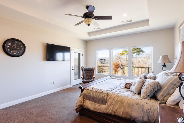 437 N Northstar Dr, St George, UT 84770 - bedroom with carpet, access to outside, ceiling fan, and a tray ceiling
