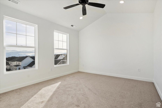 7029 W S Jordan Pkwy Unit 380, South Jordan, UT 84009 - spare room with light carpet, recessed lighting, vaulted ceiling, a ceiling fan, and baseboards