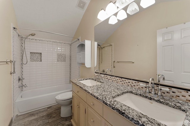 631 N 380 W, La Verkin, UT 84745 - bathroom with shower / bath combination, lofted ceiling, toilet, wood finished floors, and double vanity