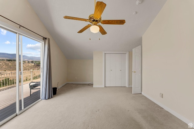 631 N 380 W, La Verkin, UT 84745 - additional living space with lofted ceiling, a mountain view, light carpet, baseboards, and a ceiling fan
