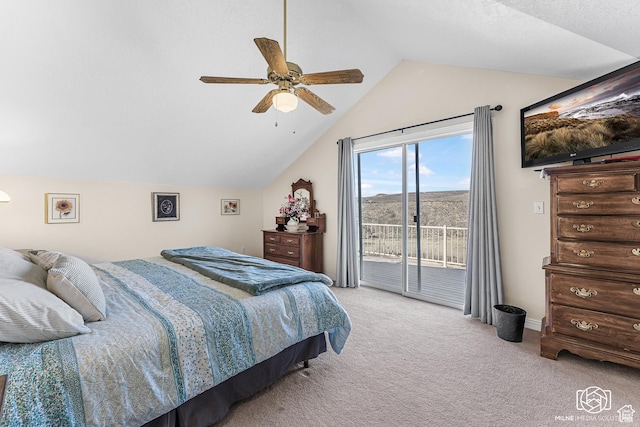 bedroom with access to exterior, carpet flooring, ceiling fan, and vaulted ceiling