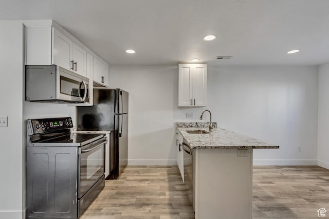 1153 W 1425th Dr N, Lehi, UT 84043 - kitchen featuring light stone counters, sink, black appliances, light hardwood / wood-style floors, and white cabinetry