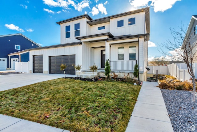 1153 W 1425th Dr N, Lehi, UT 84043 - view of front of property featuring a garage and a front lawn