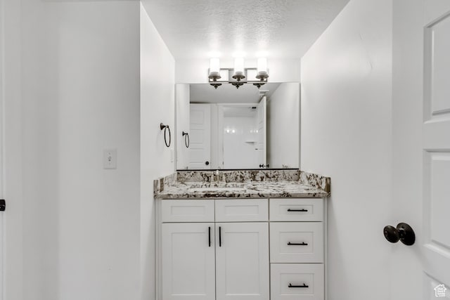 1153 W 1425th Dr N, Lehi, UT 84043 - bathroom with vanity and a textured ceiling