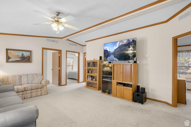 carpeted living room with vaulted ceiling and ceiling fan