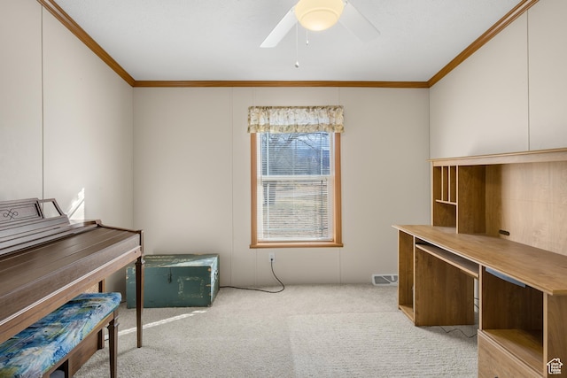 miscellaneous room featuring light colored carpet, ceiling fan, and crown molding