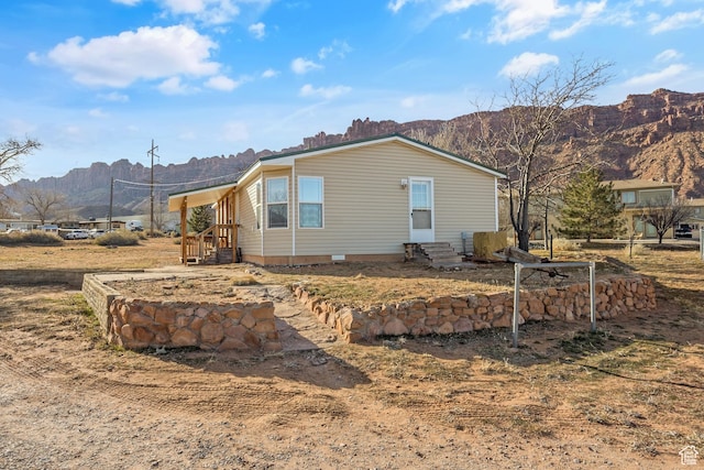 exterior space featuring a mountain view