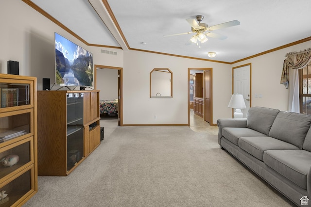 living room with crown molding, ceiling fan, light carpet, and vaulted ceiling