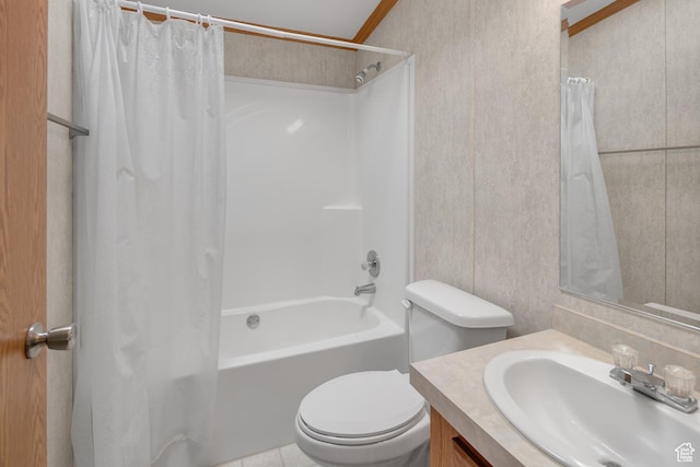 full bathroom with vanity, shower / bath combination with curtain, toilet, and ornamental molding