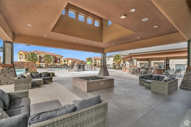 323 N 2020 W Unit 38, Hurricane, UT 84737 - view of patio with an outdoor living space, pool water feature, and a community pool