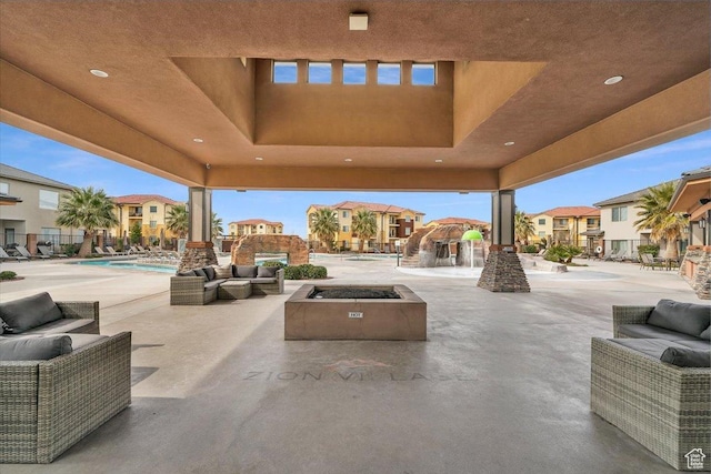 323 N 2020 W Unit 38, Hurricane, UT 84737 - view of patio / terrace with an outdoor living space, pool water feature, and a community pool