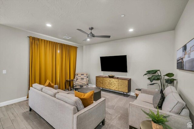 323 N 2020 W Unit 38, Hurricane, UT 84737 - living room with ceiling fan, light hardwood / wood-style floors, and a textured ceiling