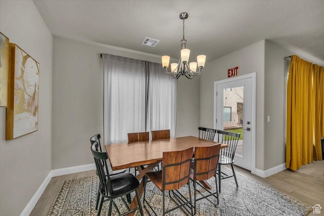 323 N 2020 W Unit 38, Hurricane, UT 84737 - dining space with light hardwood / wood-style flooring and a chandelier