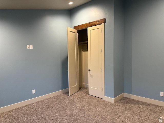 2584 S Country Club Dr Unit 12, Garden City, UT 84028 - unfurnished bedroom featuring carpet floors and recessed lighting