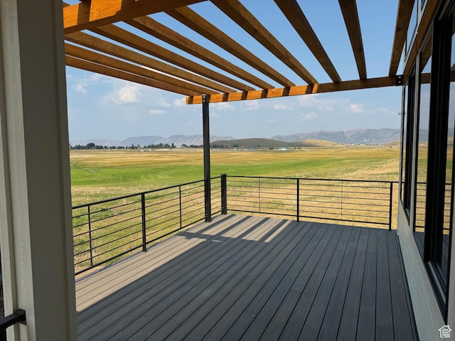 2584 S Country Club Dr Unit 12, Garden City, UT 84028 - deck with a mountain view, a view of rural / pastoral area, and a pergola