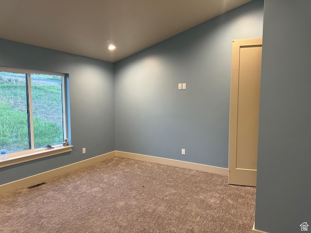 2584 S Country Club Dr Unit 12, Garden City, UT 84028 - carpeted spare room featuring baseboards and recessed lighting