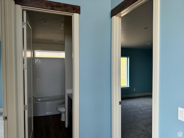 2584 S Country Club Dr Unit 12, Garden City, UT 84028 - full bathroom featuring toilet and a textured ceiling