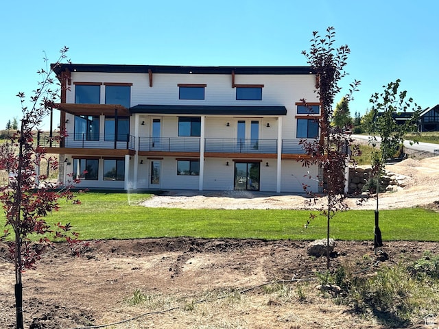 2584 S Country Club Dr Unit 12, Garden City, UT 84028 - rear view of house with a yard and a patio area