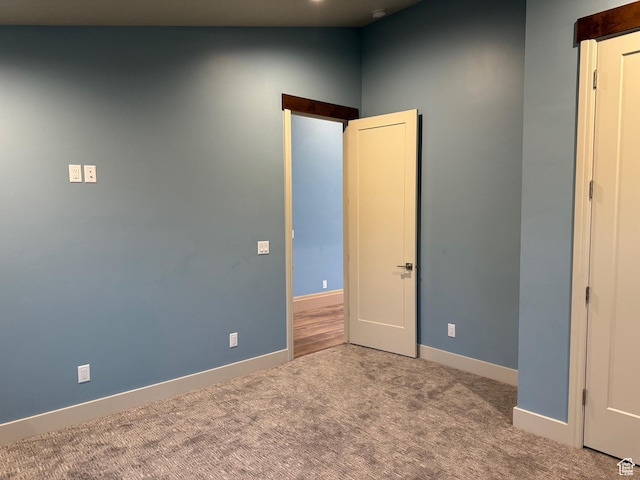 2584 S Country Club Dr Unit 12, Garden City, UT 84028 - unfurnished bedroom with carpet flooring and baseboards