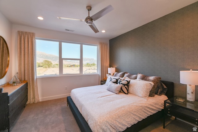 bedroom featuring recessed lighting, a ceiling fan, visible vents, baseboards, and carpet