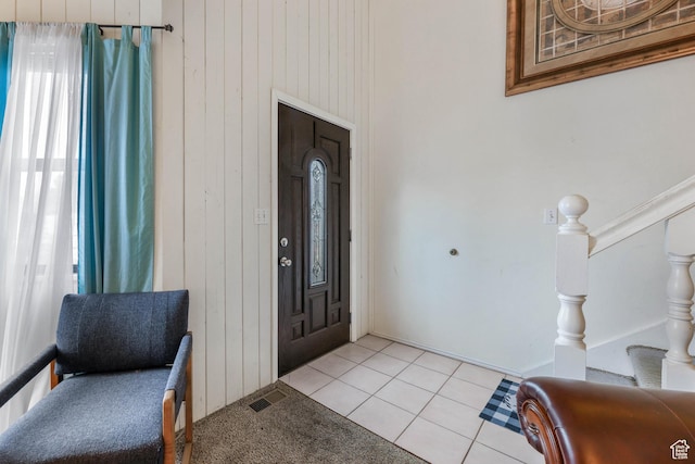 3565 E Summer Estates Cir, Cottonwood Heights, UT 84121 - entryway featuring wood walls and light tile patterned flooring