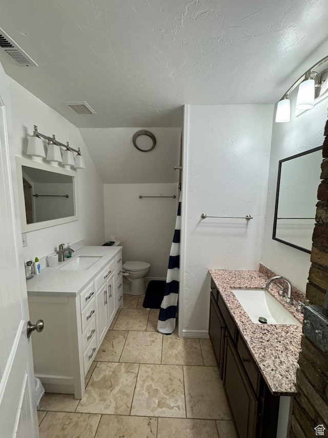 211 N 200 W, Salt Lake City, UT 84103 - bathroom with a textured ceiling, vanity, vaulted ceiling, and toilet