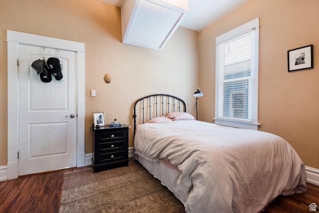211 N 200 W, Salt Lake City, UT 84103 - bedroom featuring a closet and dark hardwood / wood-style floors