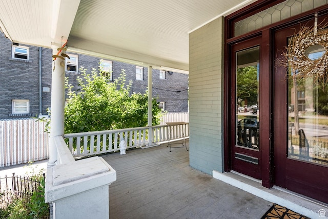 211 N 200 W, Salt Lake City, UT 84103 - wooden deck featuring covered porch