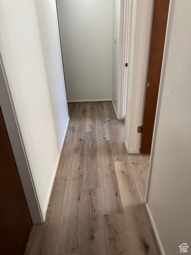 1316 S 200 W Unit 14, Bountiful, UT 84010 - hallway featuring baseboards and wood finished floors