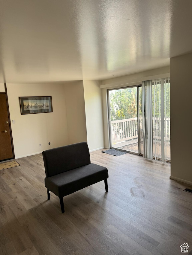 1316 S 200 W Unit 14, Bountiful, UT 84010 - sitting room with wood finished floors, baseboards, and visible vents