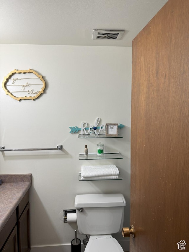 1316 S 200 W Unit 14, Bountiful, UT 84010 - bathroom featuring toilet, vanity, and visible vents