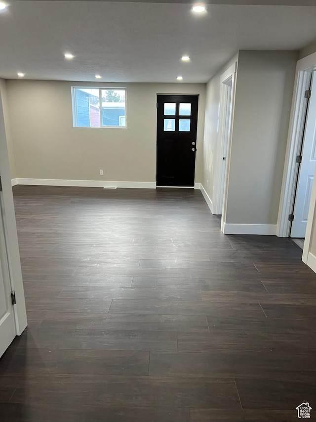 foyer with dark hardwood / wood-style flooring