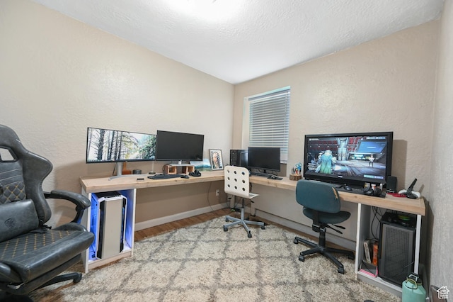 1518 E 9000 N, Preston, ID 83263 - office space with baseboards, a textured wall, and wood finished floors