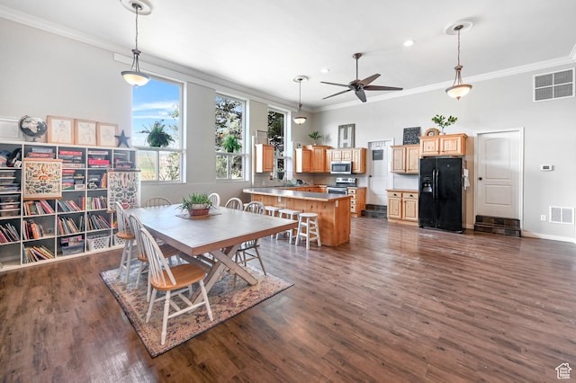 1518 E 9000 N, Preston, ID 83263 - dining room featuring visible vents, crown molding, and ceiling fan