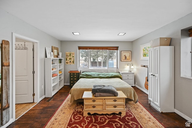 1518 E 9000 N, Preston, ID 83263 - bedroom with baseboards and dark wood-type flooring