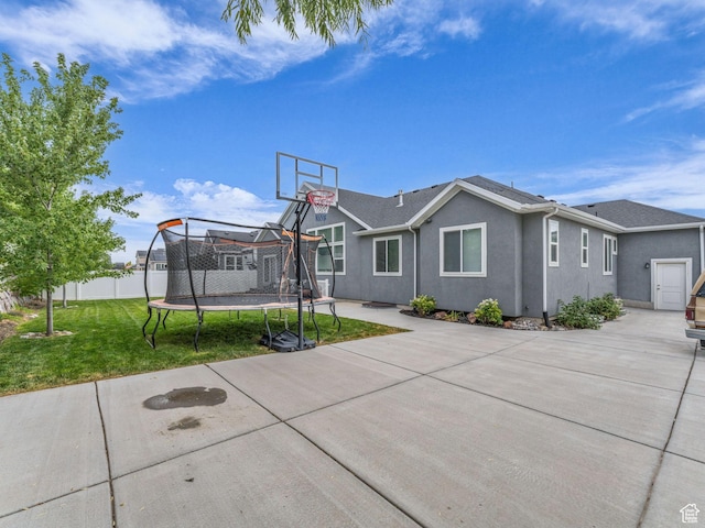 13456 S Rowell Dr, Herriman, UT 84096 - view of basketball court with a trampoline