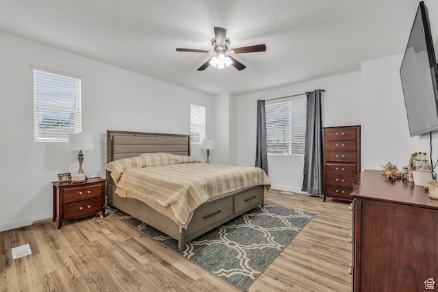 13456 S Rowell Dr, Herriman, UT 84096 - bedroom with light wood finished floors and ceiling fan