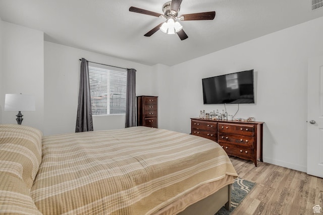 13456 S Rowell Dr, Herriman, UT 84096 - bedroom featuring wood finished floors and ceiling fan