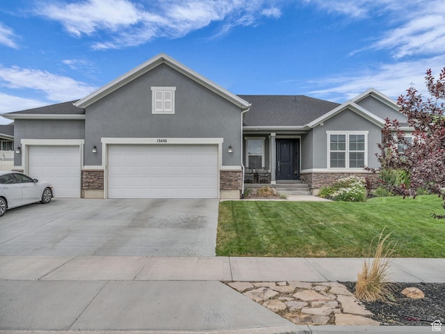 13456 S Rowell Dr, Herriman, UT 84096 - view of front facade featuring stucco siding, an attached garage, a front lawn, and stone siding