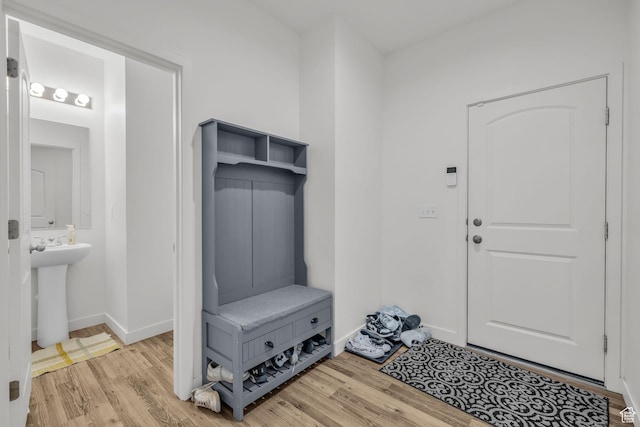 13456 S Rowell Dr, Herriman, UT 84096 - mudroom featuring wood finished floors and baseboards