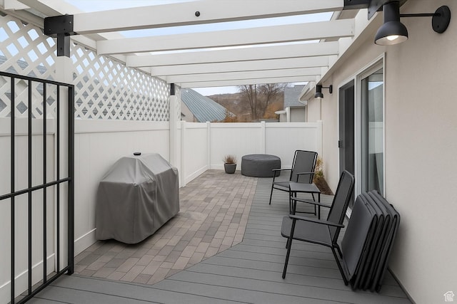 28 N River Pointe Dr, Logan, UT 84321 - wooden terrace with a pergola, grilling area, a fenced backyard, and a patio