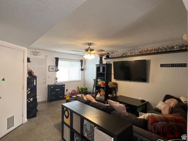 3134 S Buena Verde Ln, Magna, UT 84044 - carpeted living room featuring ceiling fan and a textured ceiling