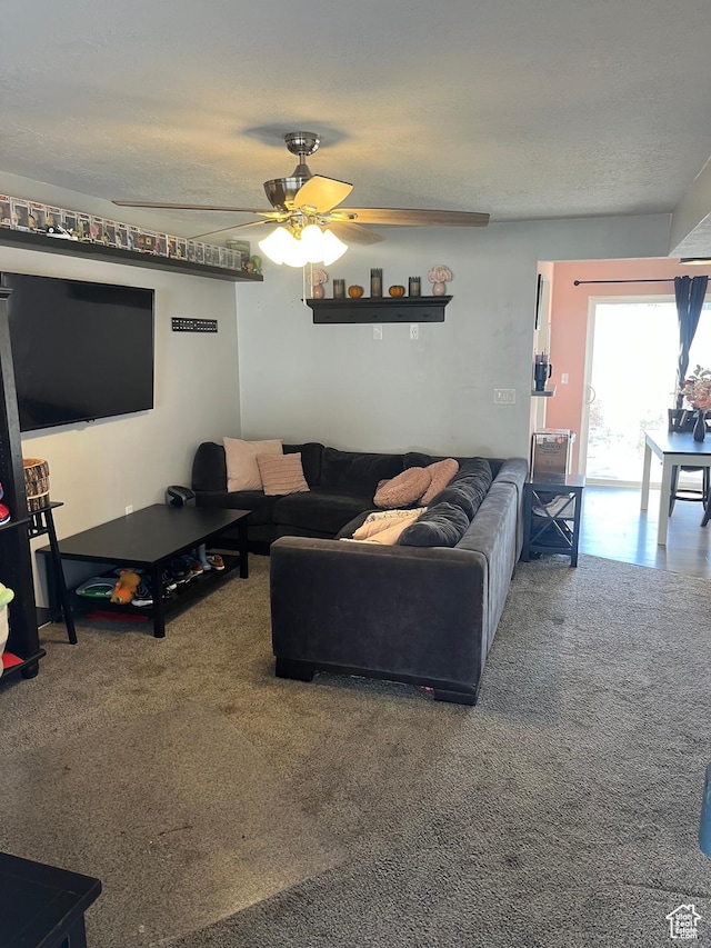 3134 S Buena Verde Ln, Magna, UT 84044 - living room with ceiling fan, a textured ceiling, and carpet flooring