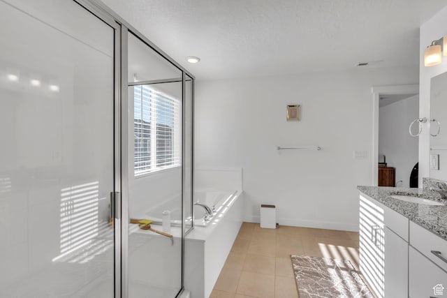 1025 S 850 W, American Fork, UT 84003 - bathroom featuring shower with separate bathtub, vanity, a textured ceiling, and tile patterned floors