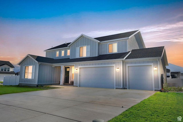 1025 S 850 W, American Fork, UT 84003 - view of front of property with a garage and a lawn