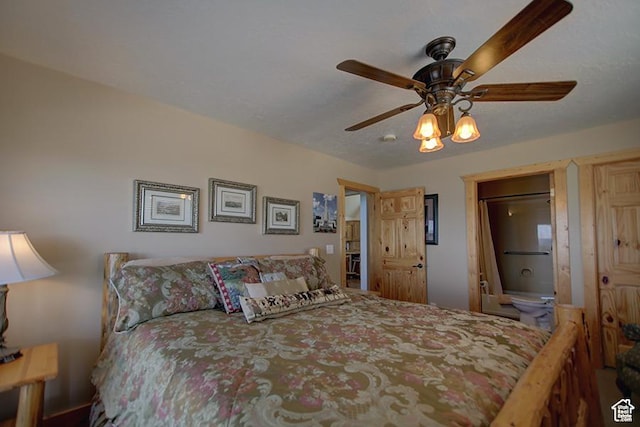 2310 S Sweetwater Pkwy Unit 5, Garden City, UT 84028 - bedroom with connected bathroom and ceiling fan