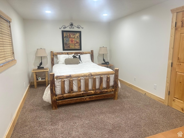 2310 S Sweetwater Pkwy Unit 5, Garden City, UT 84028 - carpeted bedroom with recessed lighting and baseboards