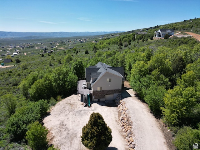 2310 S Sweetwater Pkwy Unit 5, Garden City, UT 84028 - aerial view of property and surrounding area featuring a heavily wooded area and a mountain backdrop