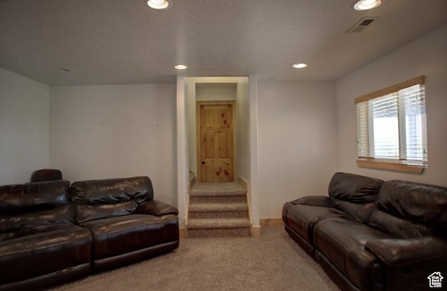 2310 S Sweetwater Pkwy Unit 5, Garden City, UT 84028 - carpeted living room featuring recessed lighting and stairway