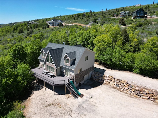 2310 S Sweetwater Pkwy Unit 5, Garden City, UT 84028 - aerial view of property and surrounding area featuring a heavily wooded area